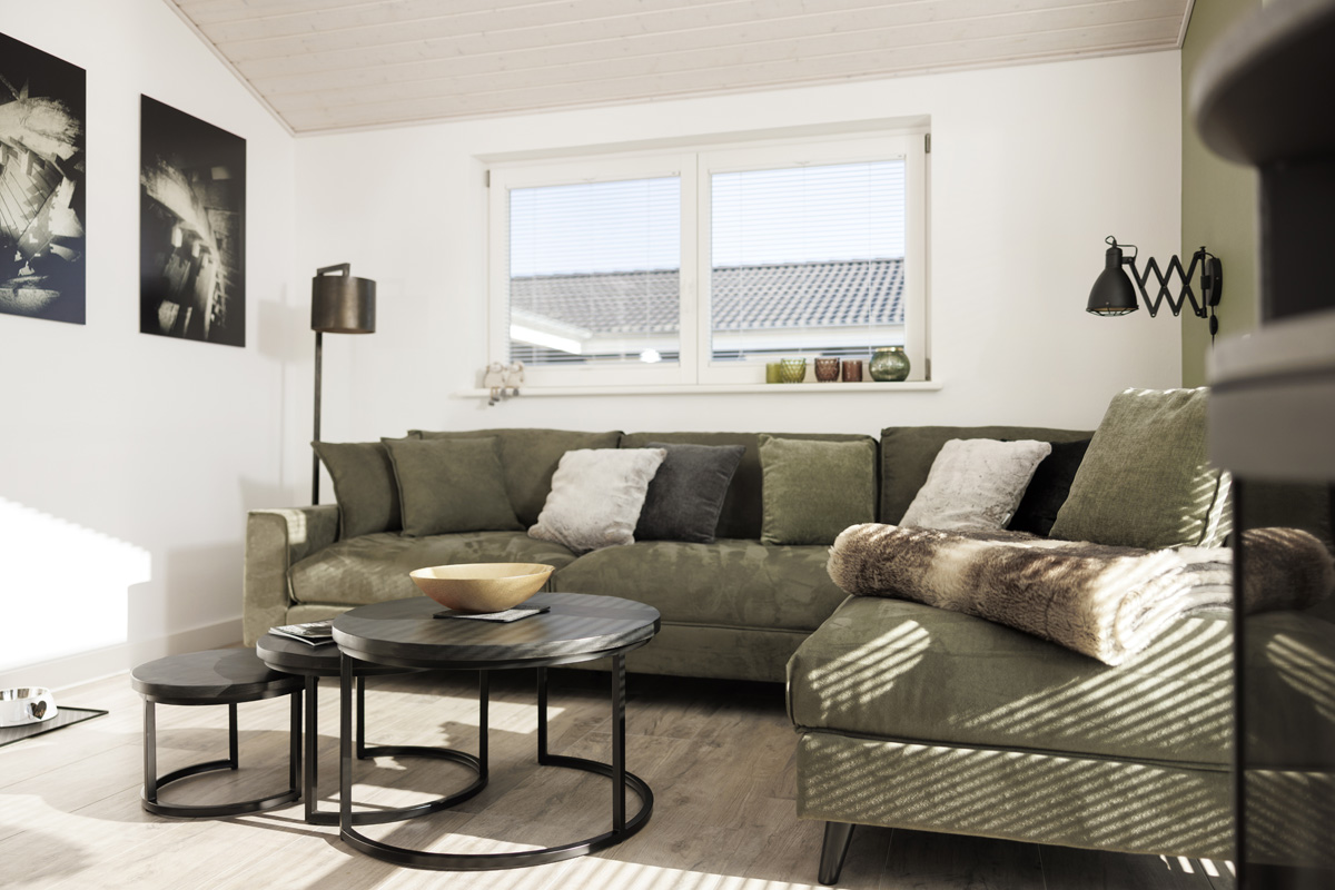 Gemütlicher Wohnbereich mit Couch im Ferienhaus Nordhorn